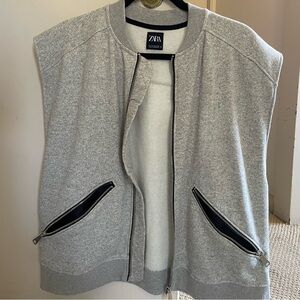 Grey ZARA vest with zipper and pockets.